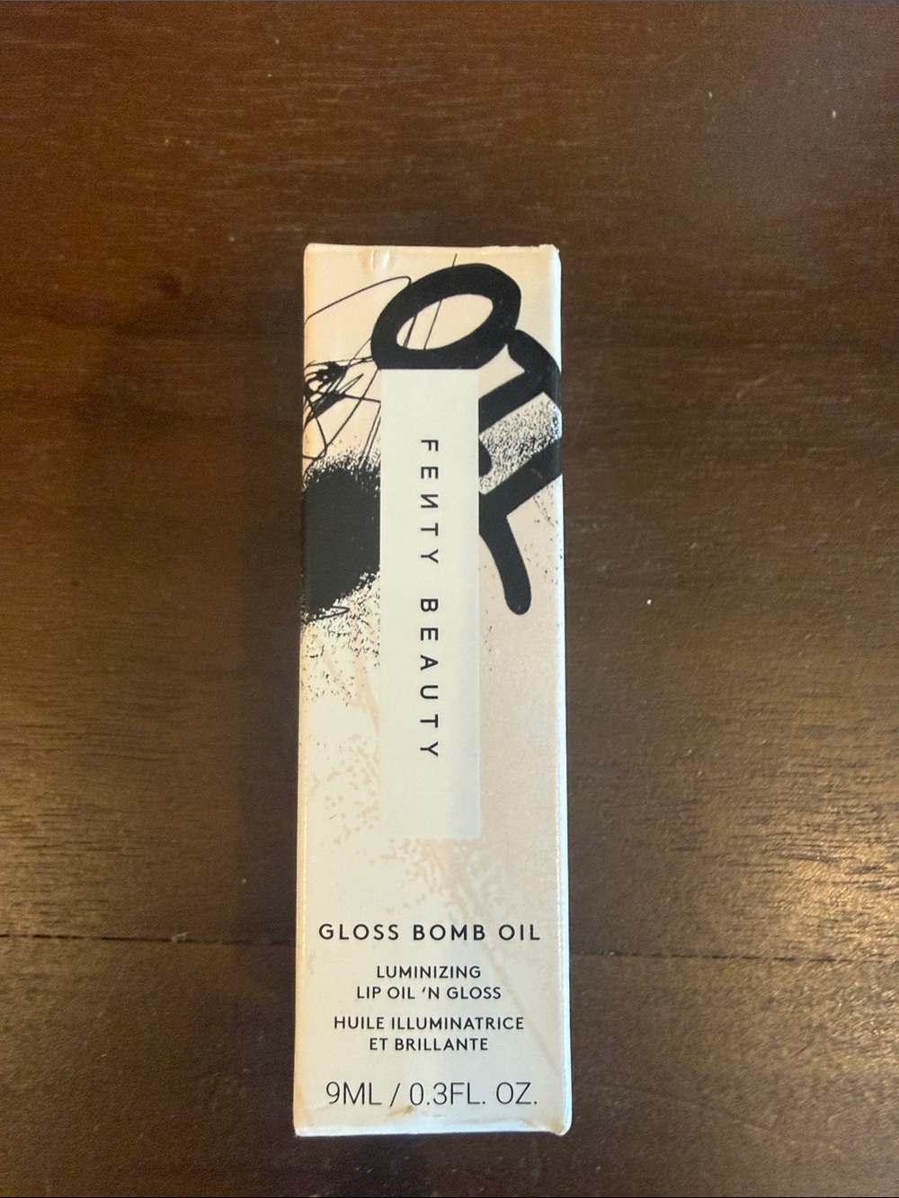 Fenty Beauty Gloss Bomb Oil in razzberry jamz Luminizing Lip Oil